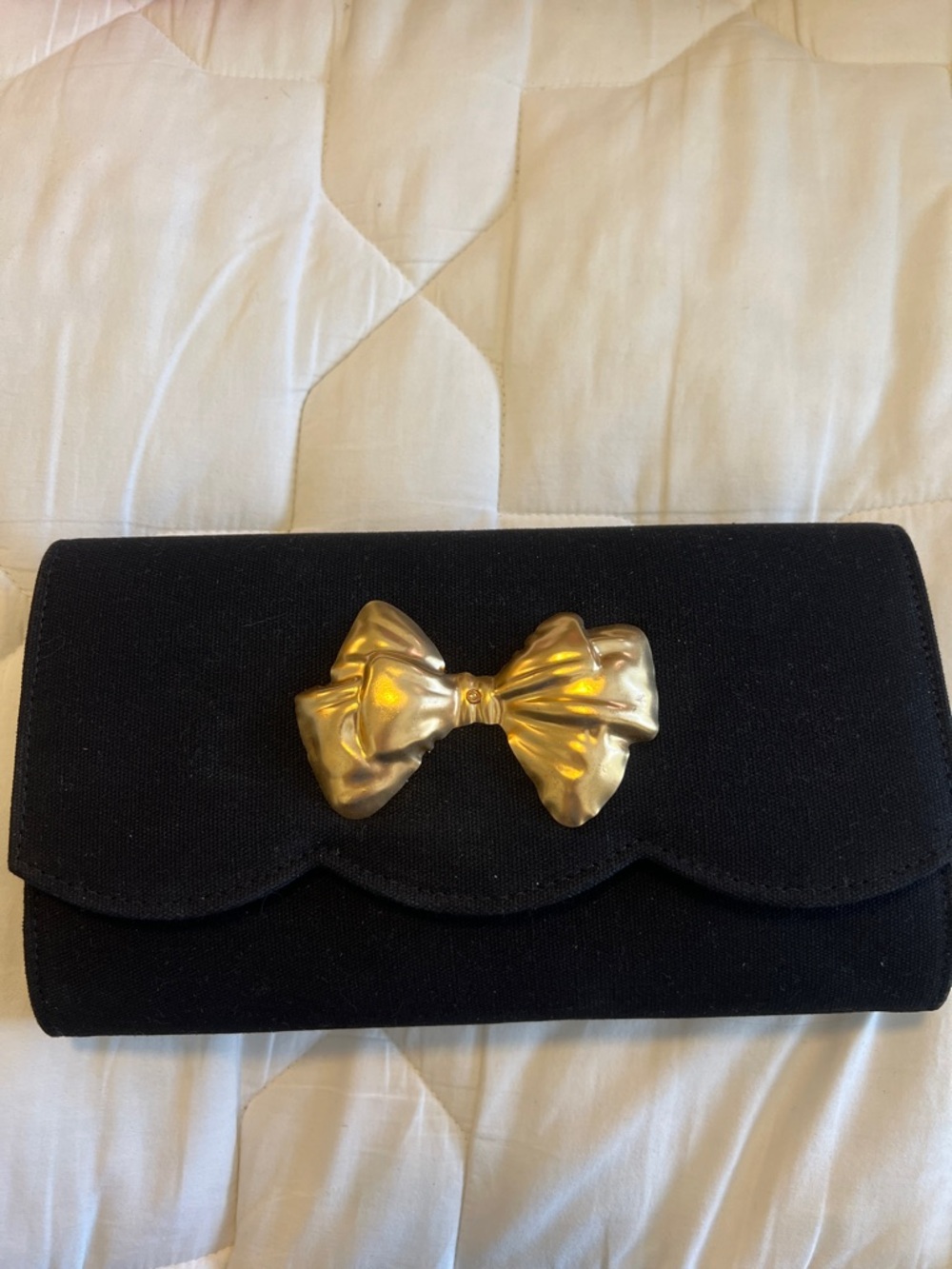 Black Clutch with Gold Bow Accent